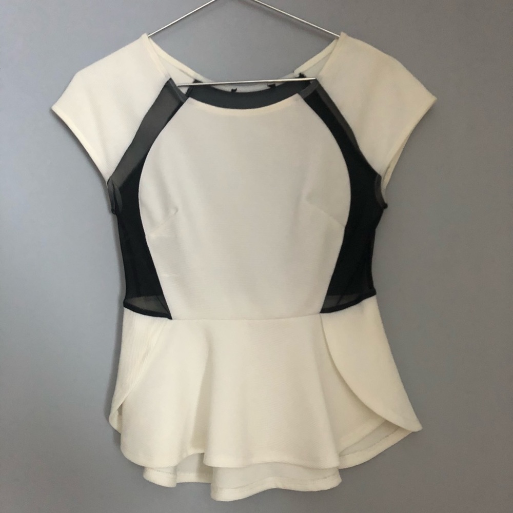 Peplum shirt with sheer back